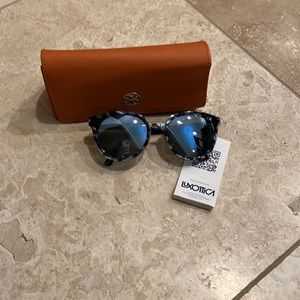 Tory Burch fashion sunglasses blue lense black and gray tortoise silver accents